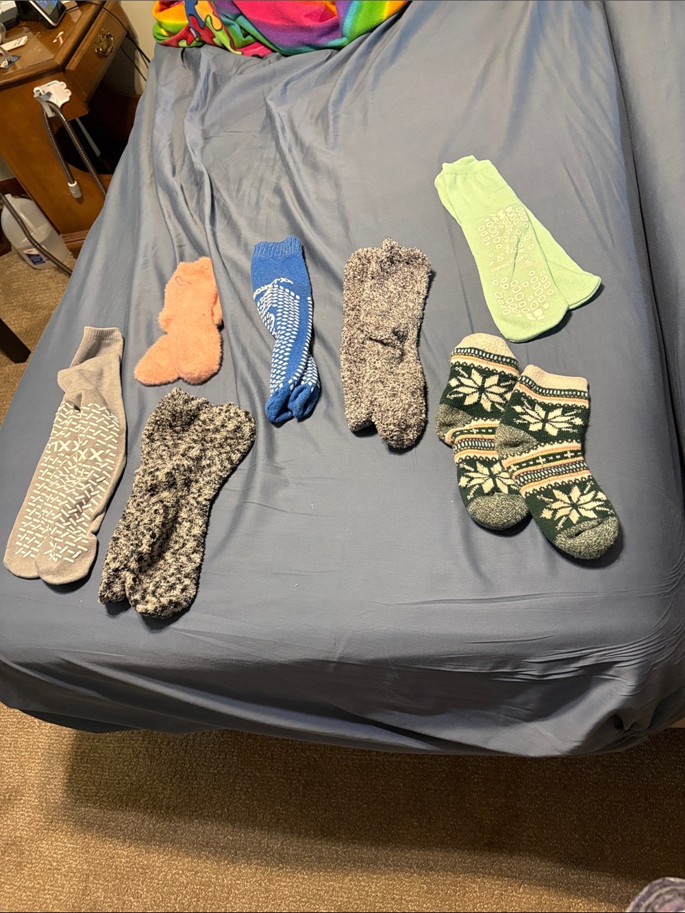 women’s socks 3 fuzzy warm socks and  4 gripper bottom socks. One fuzzy has them